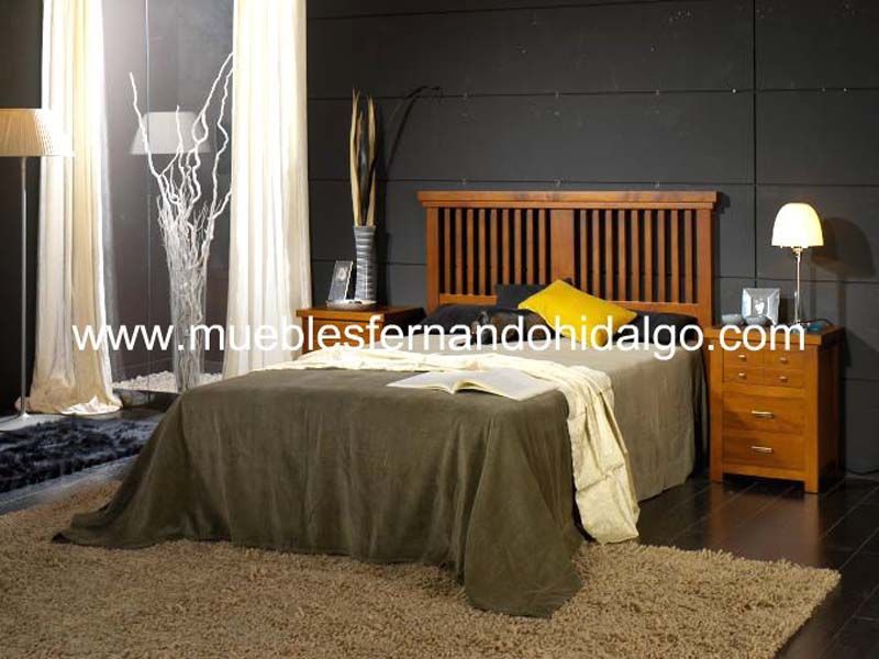 Un dormitorio con la web www.mueblesfernandohidalgo.com