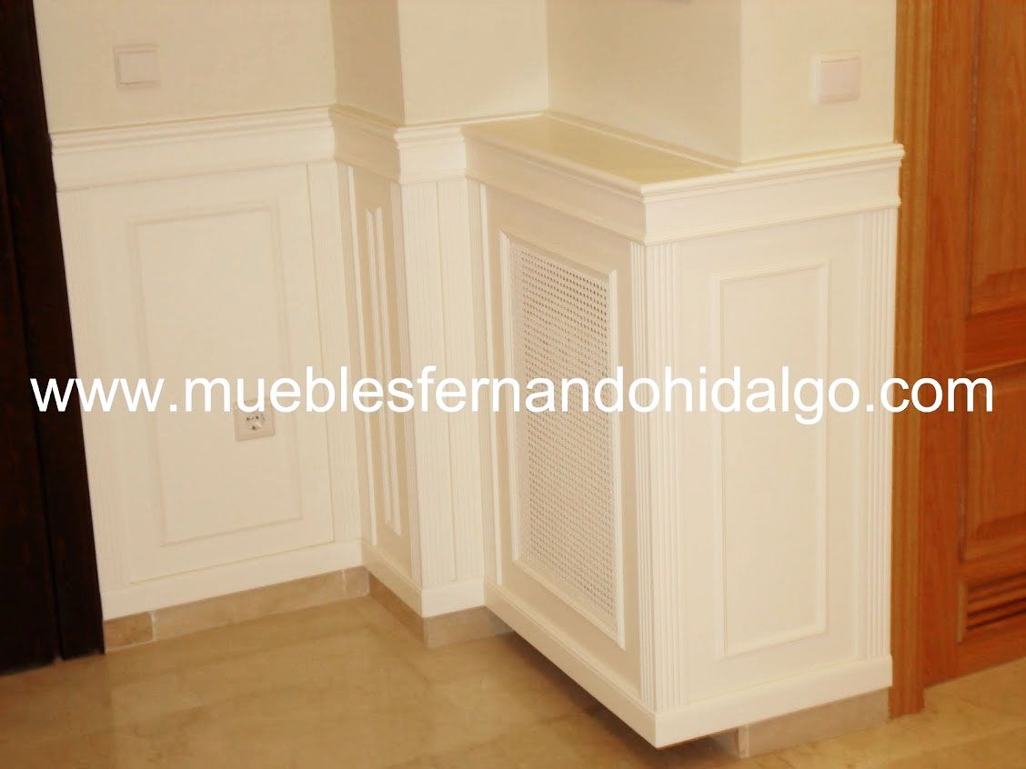 Un rincón de una habitación con la web www.mueblesfernandohidalgo.com