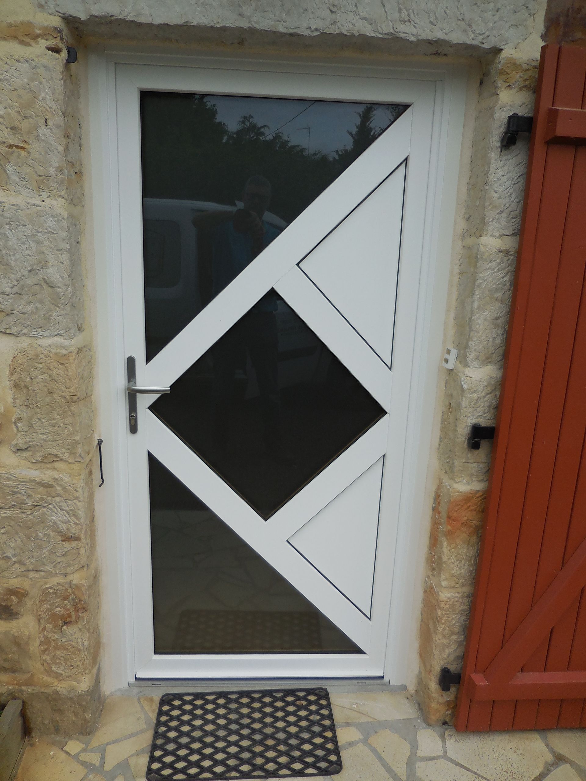 Porte entrée vitrée