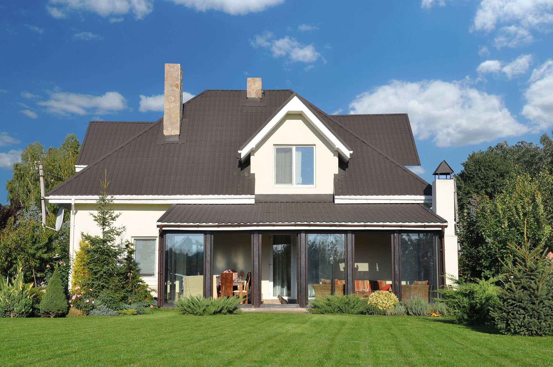 Maison avec un jardin et une véranda