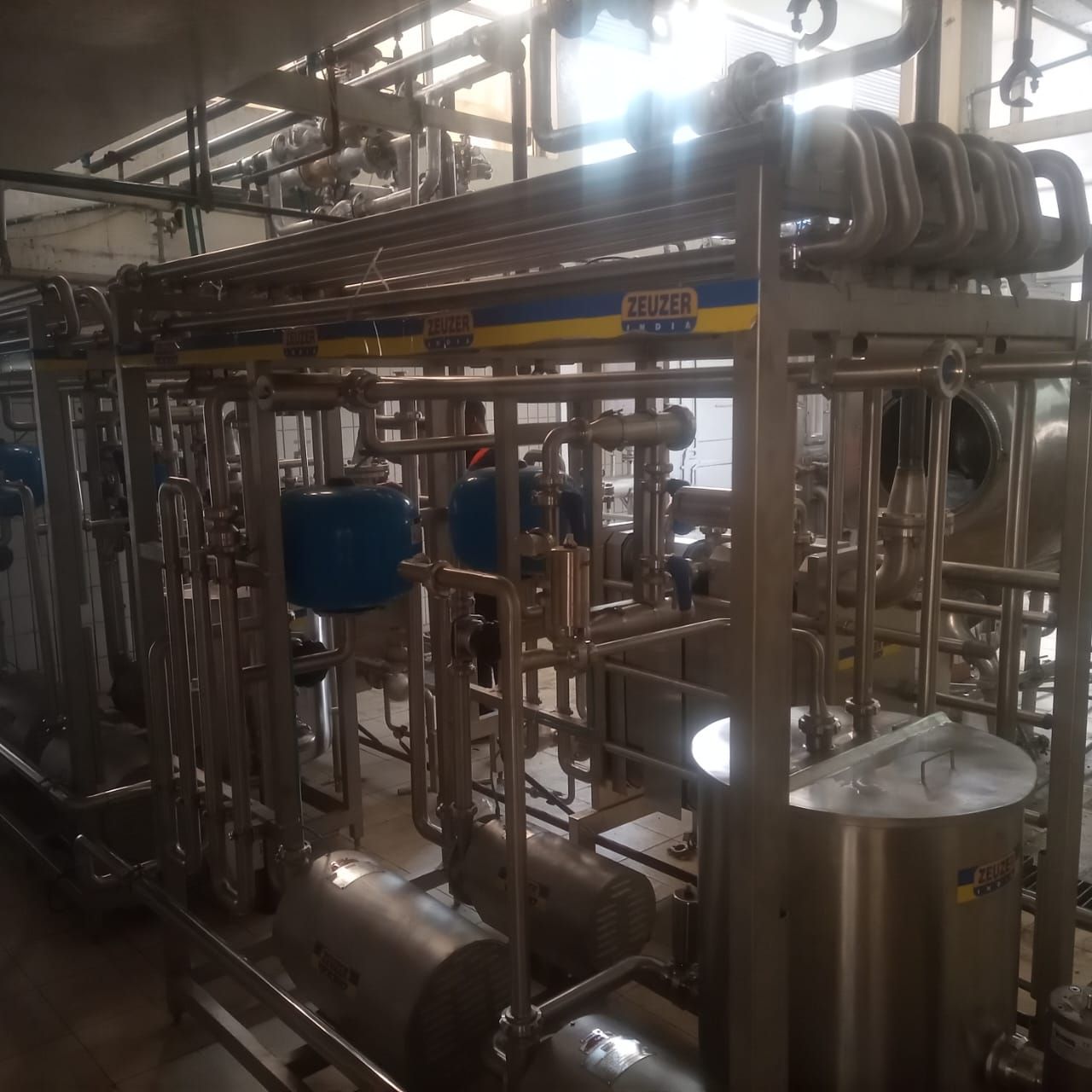 A factory with a sign that says ' stainless steel ' on it