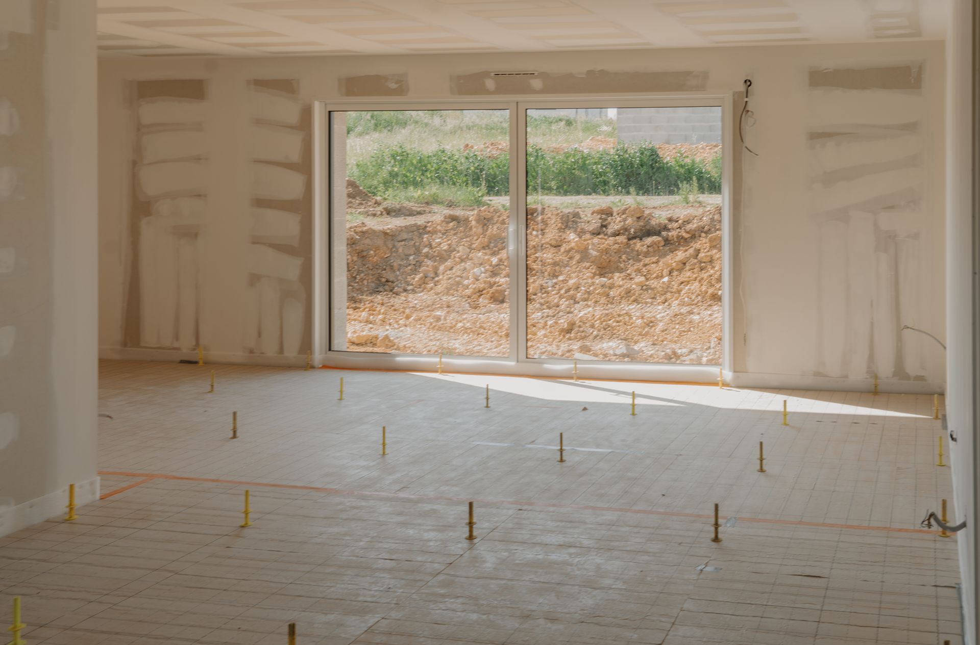 Coulage d'une dalle béton dans une pièce