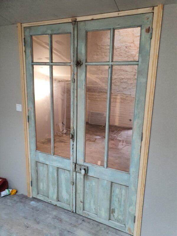 Installation d'une double porte vitrées