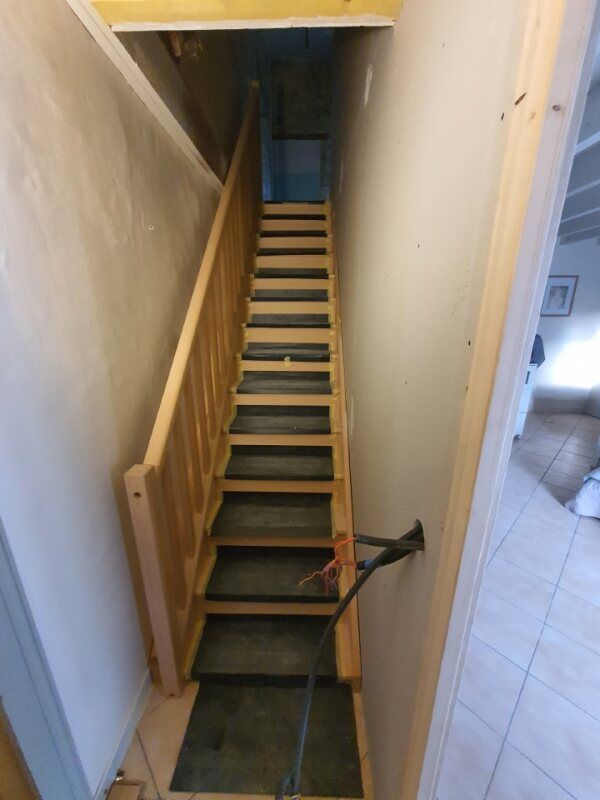Installation d'un escalier en bois