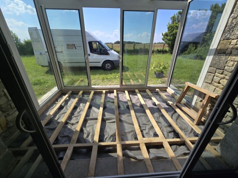 Création d'un plancher dans une véranda