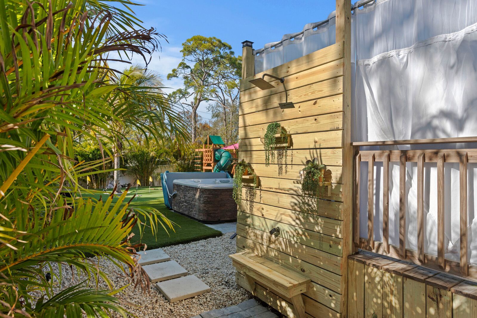 Bradenton Florida rental with splash pad, playground, and kid-friendly resort-style backyard