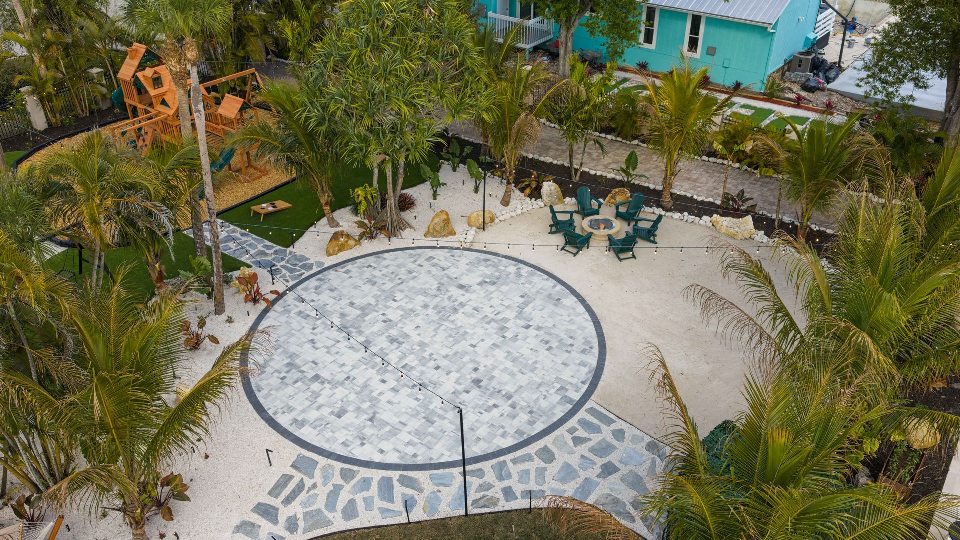 Florida vacation house near Anna Maria Island with kid-friendly pool, playground, and outdoor fun