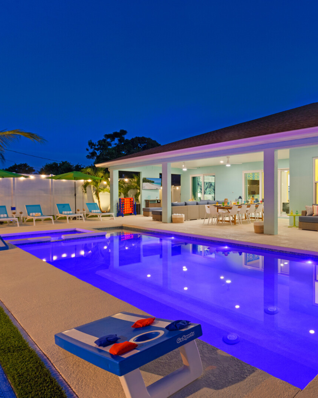 Luxury Bradenton rental home with heated pool, pickleball, and outdoor lounge.