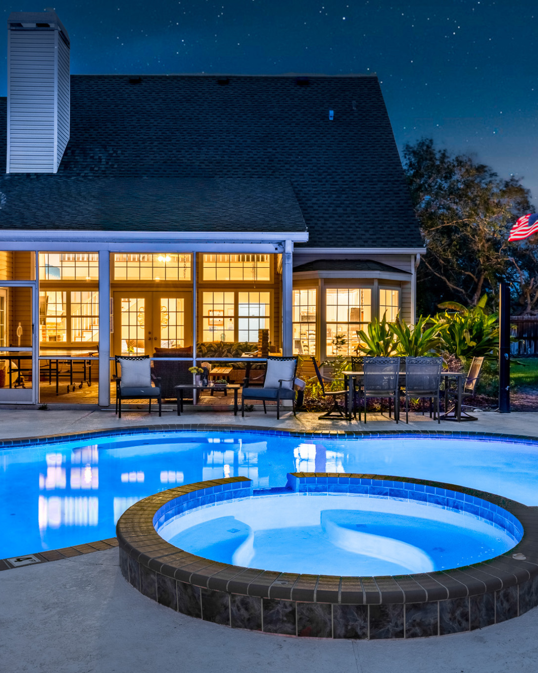 Sunny Bradenton pool with mural and guest on flamingo float