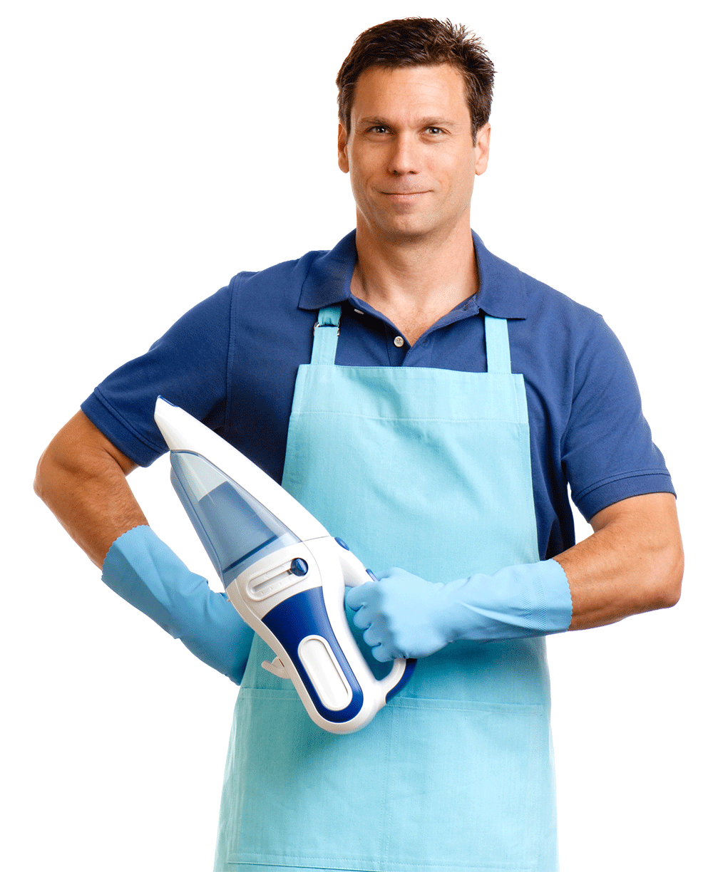 Mann in blauer Schürze und Handschuhen, hält einen Handstaubsauger.