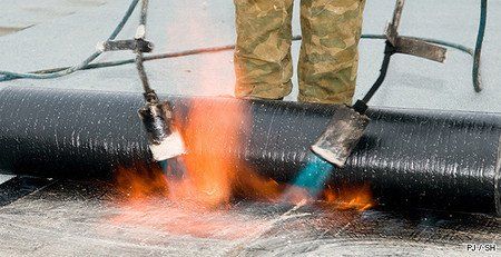 Pose d'isolant de toit